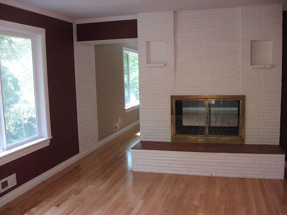Other side of formal with large windows overlooking creek