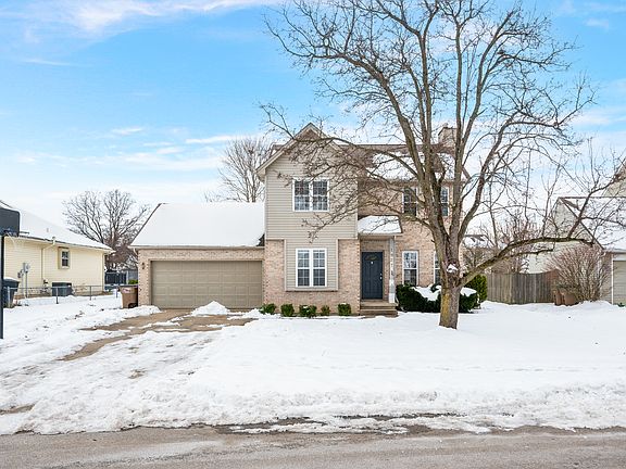 Front view of house with driveway for parking and street parking if needed
