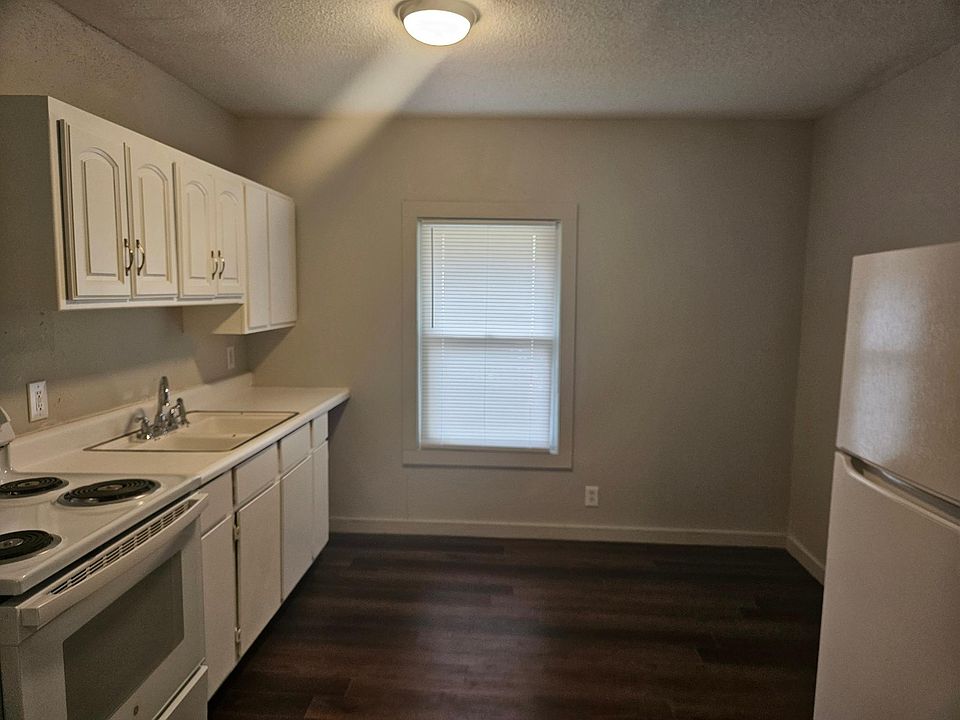 Eat in Kitchen with fridge and stove.