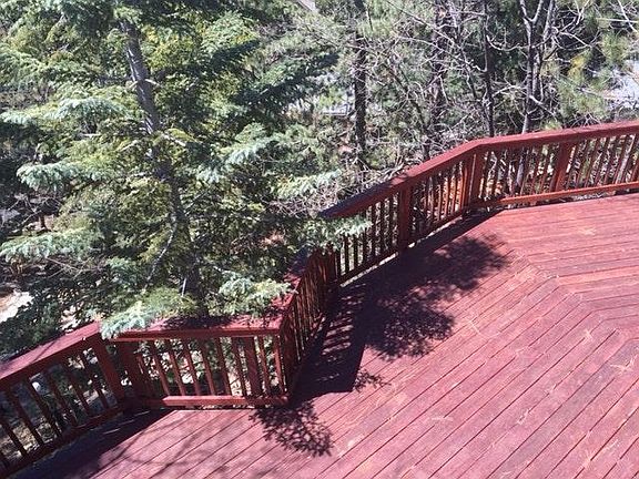 Bottom back deck of family room.