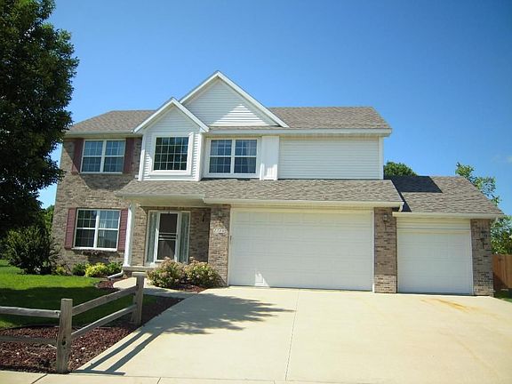 Large Two Story With Three Stall Garage!