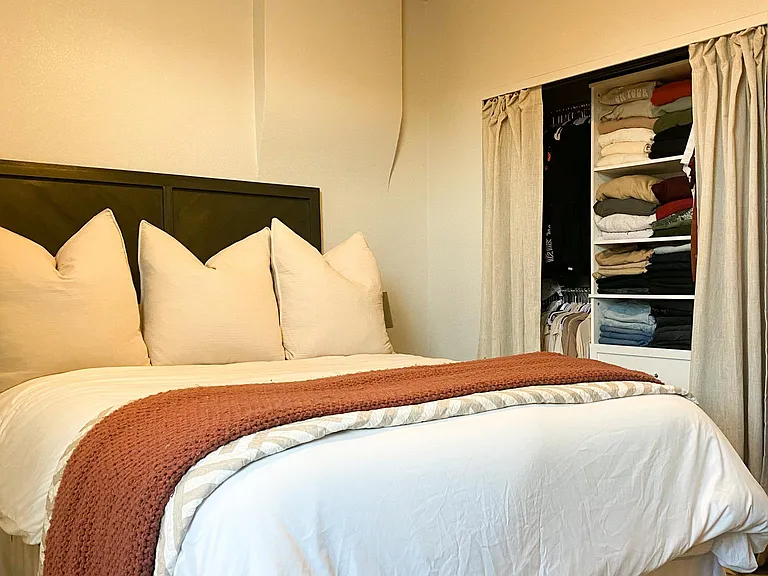 Bedroom fit for a queen or king size bed, with updated closet with extra storage