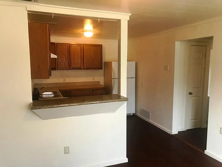 KITCHEN LOOKING FROM DINING AREA