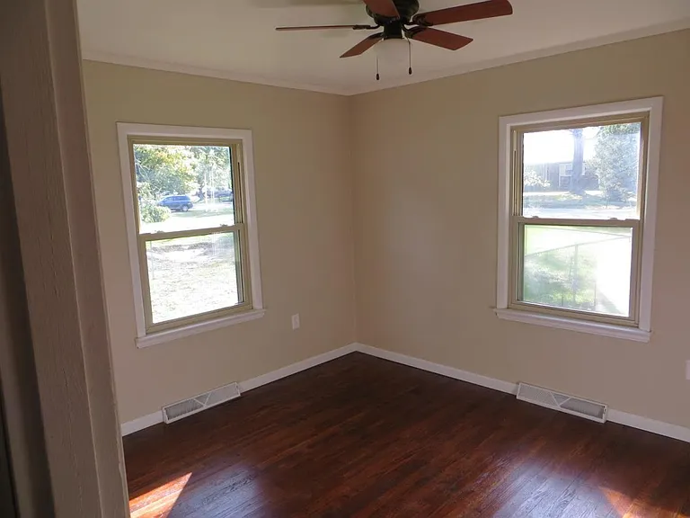 Bedroom with hardwood