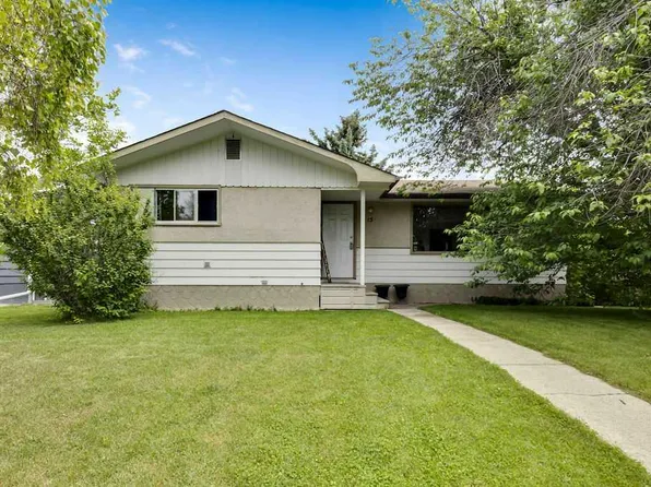 15 NW Glenway Dr SW, Calgary, AB T3E 4T7