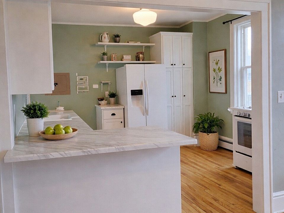 Kitchen view from Dining Room. Staged using ChatGPT.
