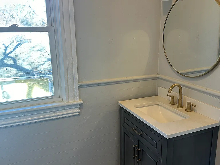 Upstairs vanity in bathroom