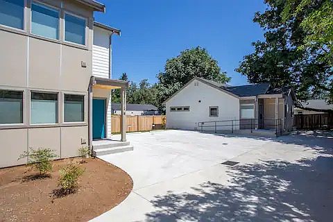 2 parking spaces next to the unit which is on the left.