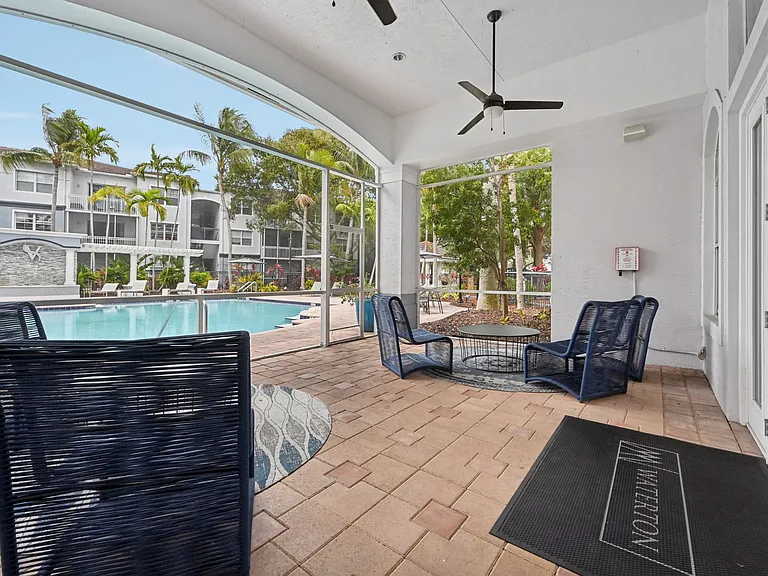 Poolside Patio at Verona at Boynton Beach Apartments in Boynton Beach, FL 33426