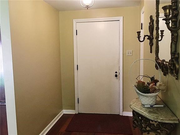 ENTRY - Spacious Entry area leads you into this comfortable home.  There is a handy coat closet on right.  The Living Room is on
