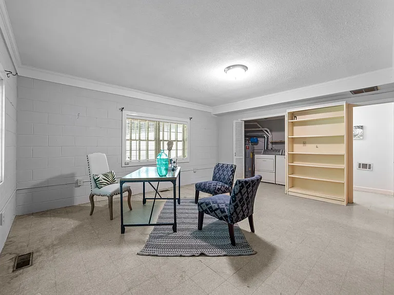 Large bonus room on lower level works as exercise room, office, or playroom.