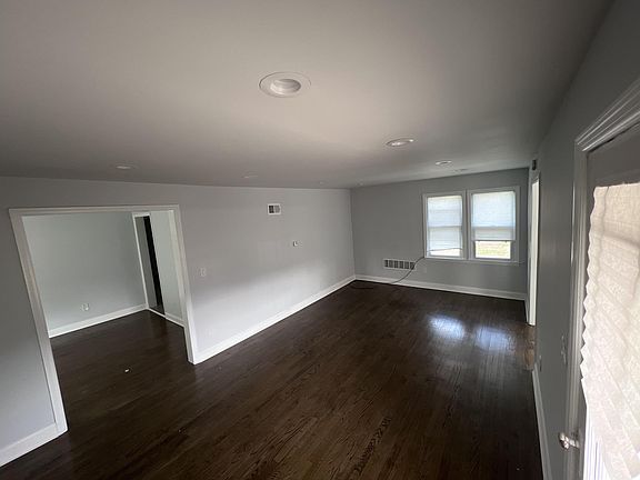 The living room is spacious and roomy.