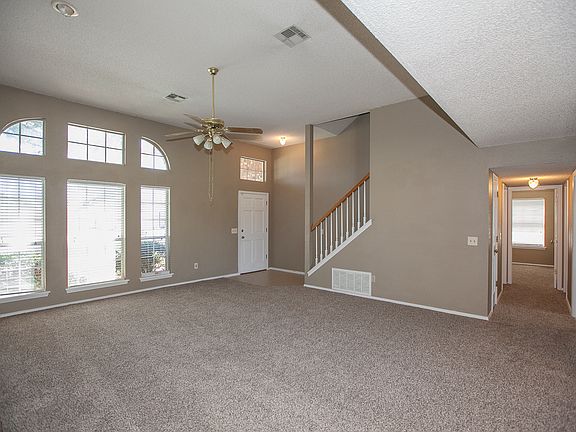 Large window with view of front yard