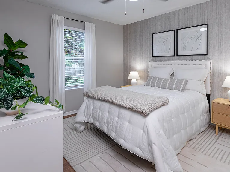 Enjoy the perfect blend of space and function in this master bedroom with abundant natural light and ample closet space.