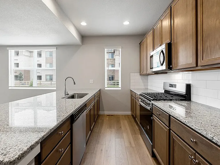 Greenways at Sand Creek Townhomes — Photo 3