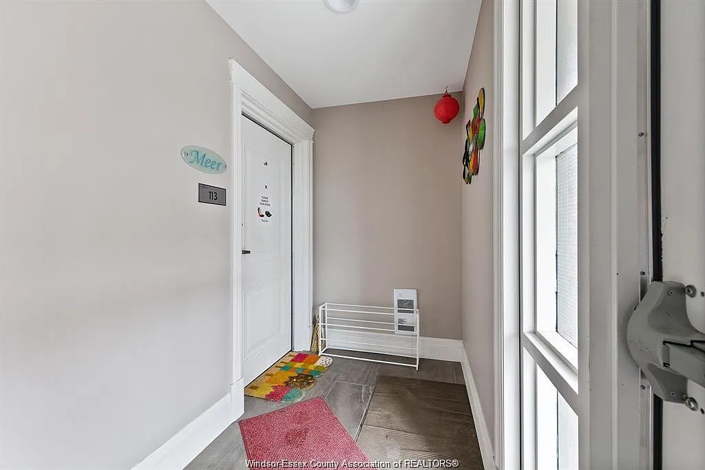 Building Photo - 8475 Wyandotte St E #113