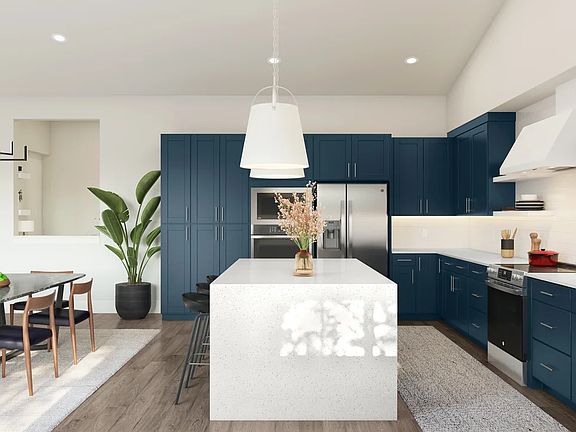 Kitchen with waterfall island with floating shelves