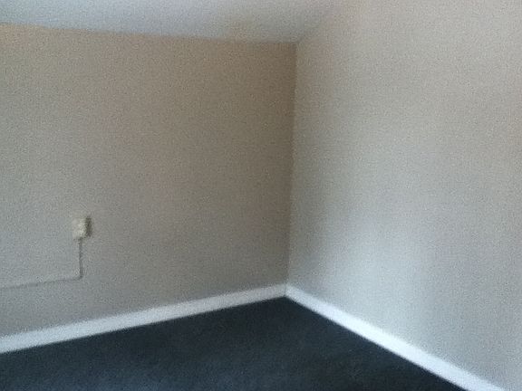 2nd bedroom prior to newer carpet & paint