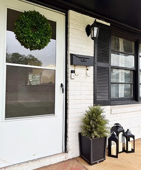 Inviting entrance with aesthetic front porch.
