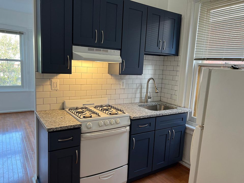 brand new kitchen w skate blue cabinetry