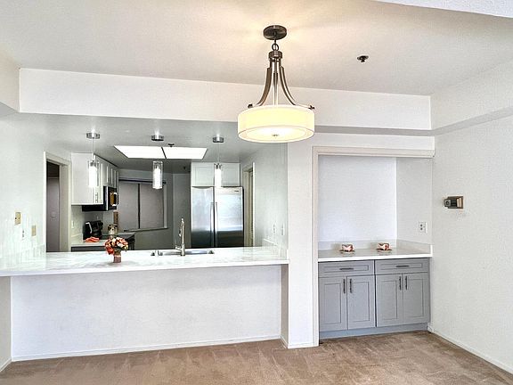 Formal dinning area and breakfast bar