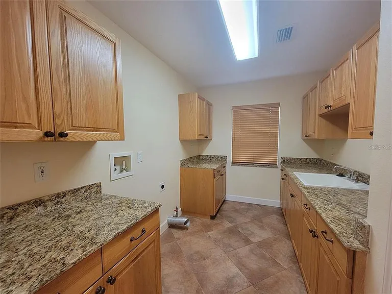10209 Thurston Groves Blvd — Photo 41