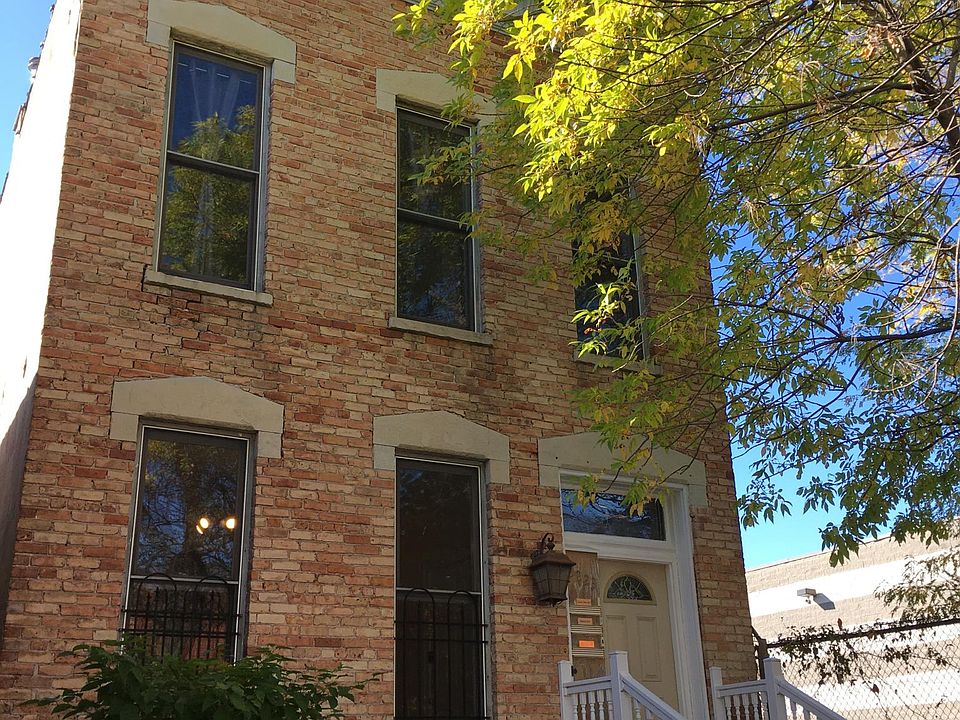 Twentytwo23 West Hubbard an 1880's brick 2 flat once housed an Al Capone business now is a sustainably renovated 21st Century apartment building