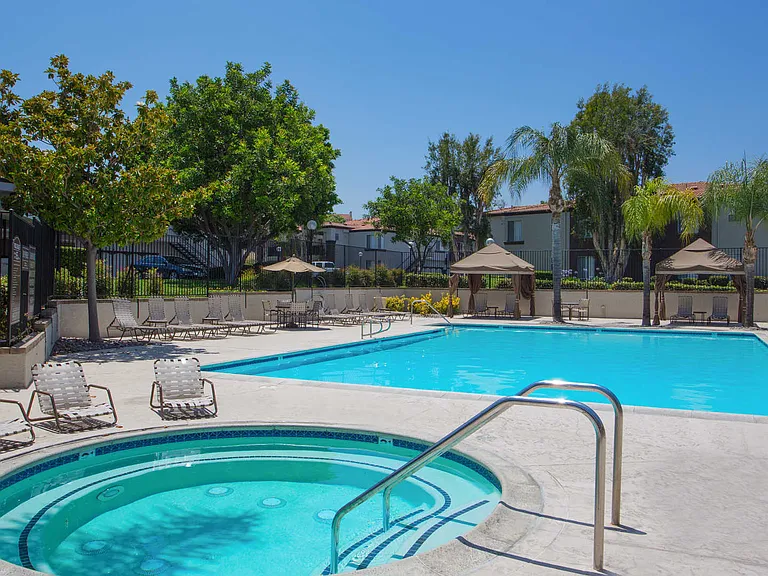 Swimming Pool with Shaded Cabanas