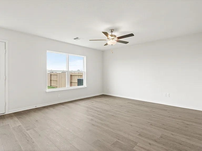 The family room of the Rio Grande has a large window that lets in great, natural light.
