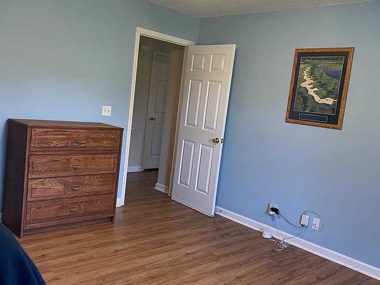 Blue room is 13.5 X 14 and is furnished with a twin bed and chest of drawers.