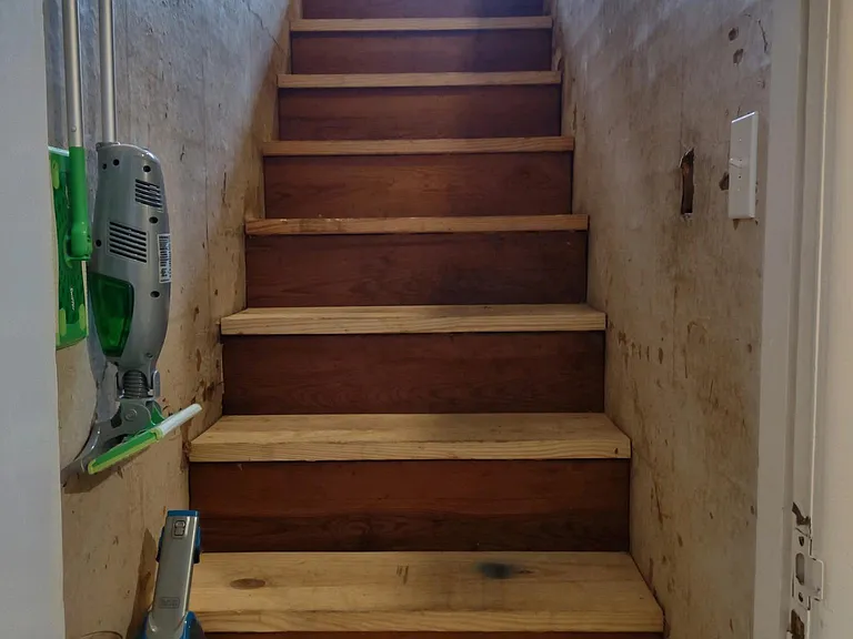 Stairs going to attic inside