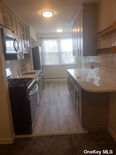 1st image of 60-41 75th St #2