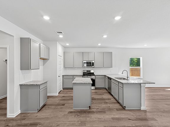 The Sparrow II- Kitchen with Island and Ample Cabinet Space