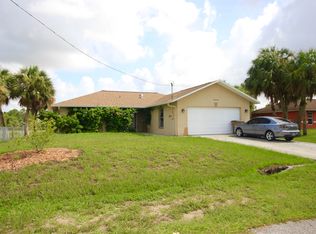 1243 Ermine St E, Lehigh Acres, FL 33974