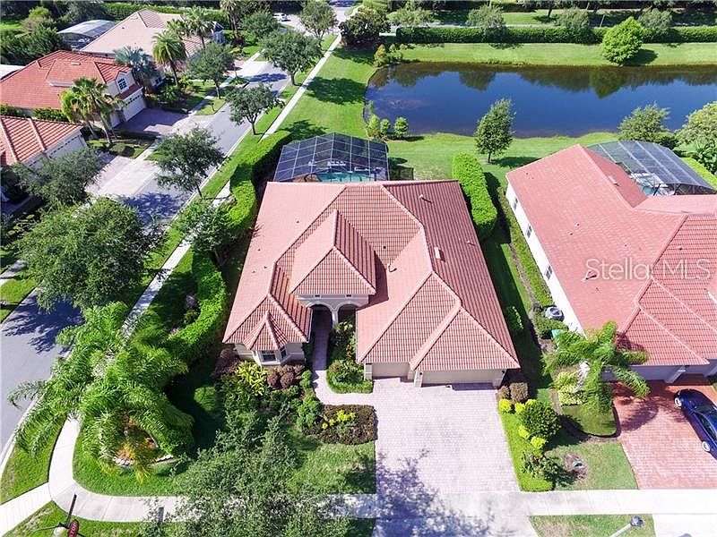 Private corner lot with view of pond