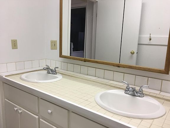 Double sinks in separate room