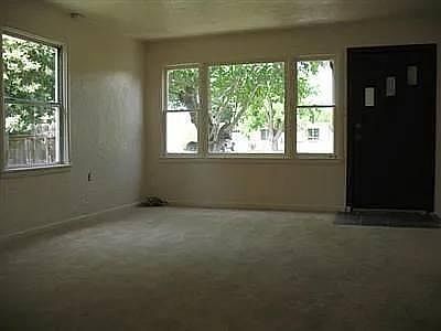 Living room now has hardwood flooring