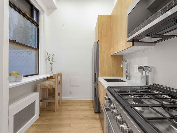 2nd image of 138 E 38th St APT 1F