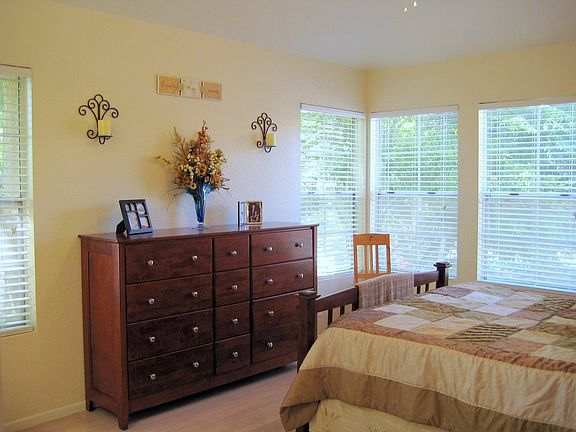 Open and bright with vaulted ceilings, tons of windows and skylights