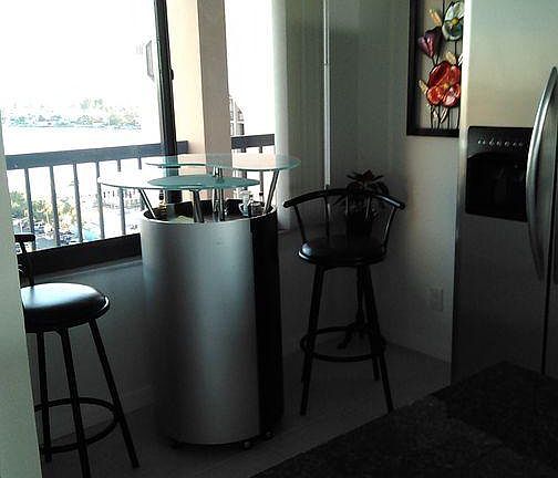 Portable bar table with bar stools