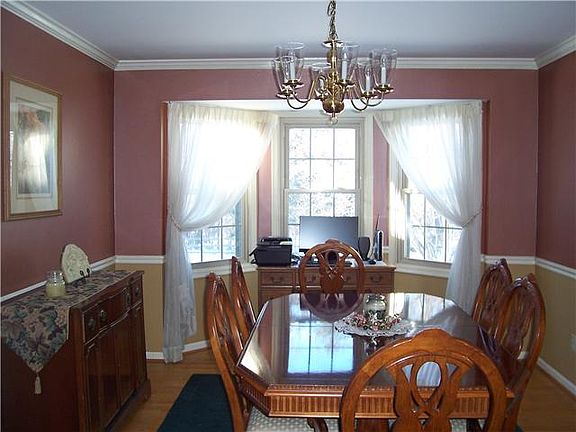 ...chair rail, crown molding & hardwoods.