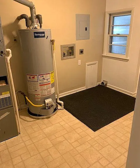 Large laundry, utility room. Washer/dry hookups.