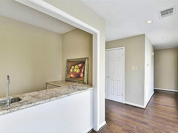 Entry with wet bar to the right