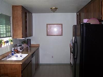 Clean kitchen with lots of storage.
