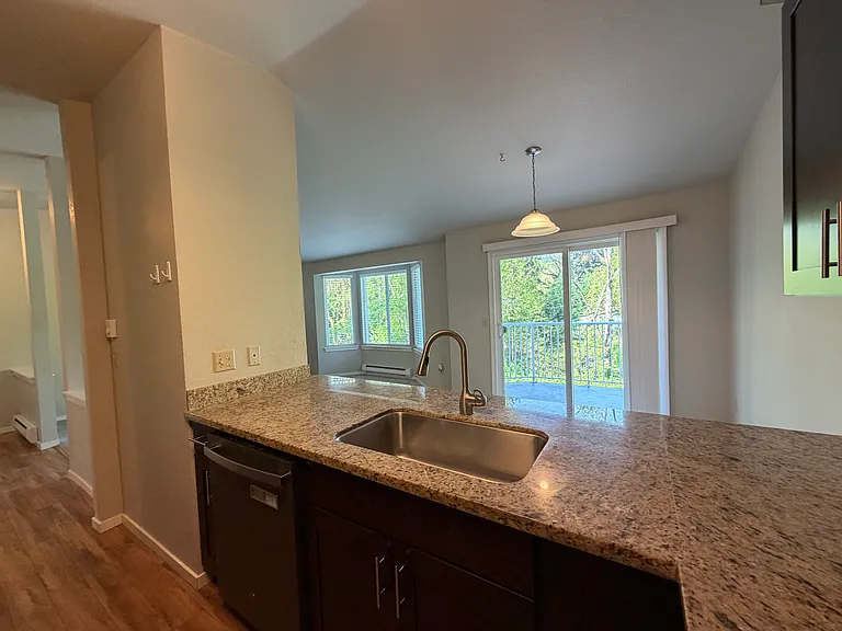 bright kitchen to dining and living room