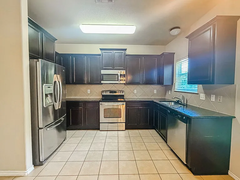 4907 Old Homestead St — Photo 2
