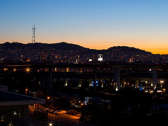 view of Sutro Tower in dusk from private balcony off living