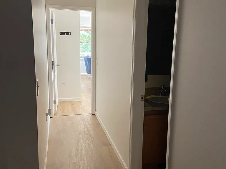 Hallway to the Master BR and Bath