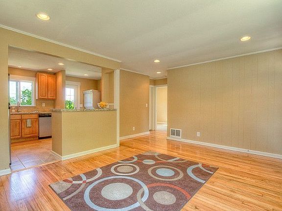 Gleaming refinished hardwood floors, all new paint, new moldings, new lighting, new electrical - com