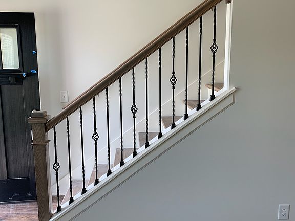 banister with iron spindles